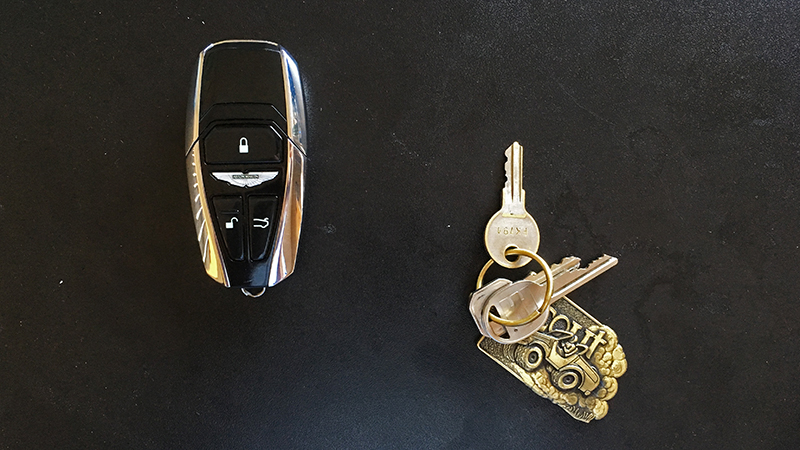 The left key operates the 2017 Aston Martin DB11. The little one on the right starts a 1975 International Scout.